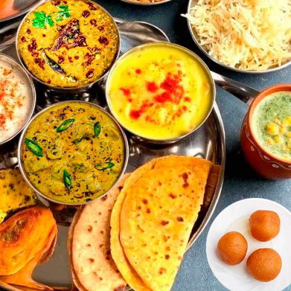 Rajasthani Meal Box- Missi Roti, Phulka, Gatta Masala, Panchmel Dal, Pakoda Kadhi, Pulao, Mithai & More