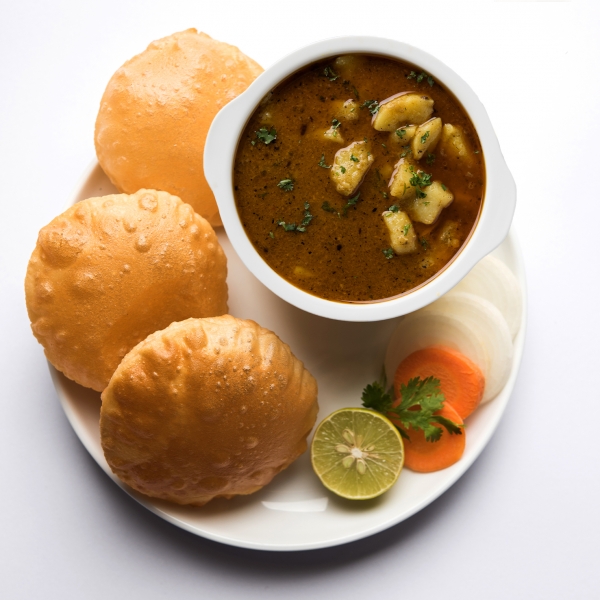 Ajwain Poori-4 Pcs., with Aloo Tamater Jhol & Pickle -